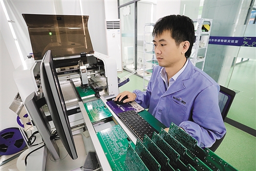 经济日报：引领企业合作闯市场